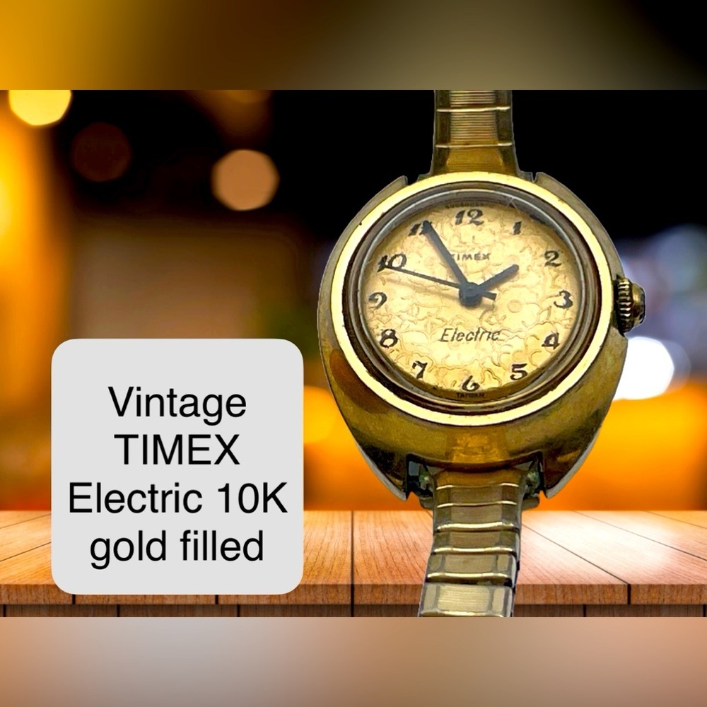 1974- Timex Electric Ladies Watch with Gold Embossed Flower Dial -10K Gold rolld